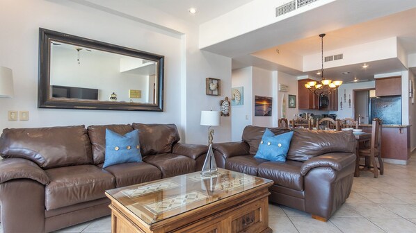 Leather sofas in living room add a sophisticated touch.