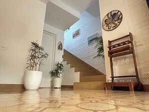Living room with a cute little standing bar