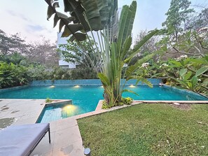 spacious swimming pool a couple of steps away from the villa