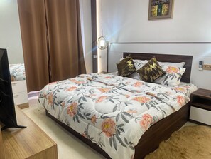Cozy Queen Size bed specially designed for your sleeping comfort