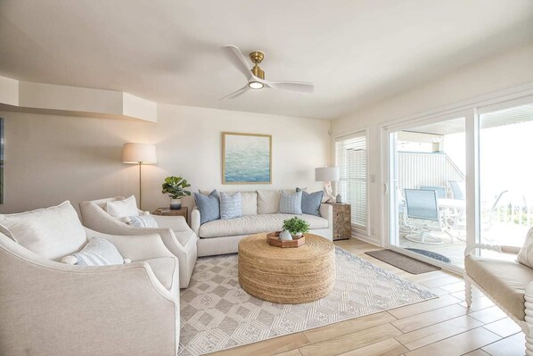 Open-concept design in this coastal living and dining area.