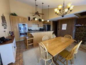 Enjoy homemade meals in our fully-equipped kitchen and family-style dining area, ready for any gathering.