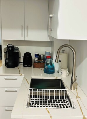 Kitchenette with fridge and microwave ( no cooking facilities)