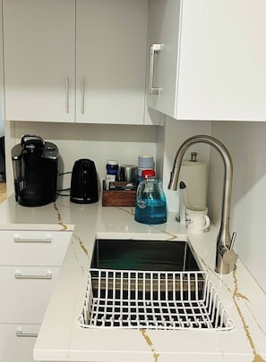 Kitchenette with fridge and microwave ( no cooking facilities)