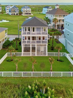 view from the back.. notice the decks and large fenced yard