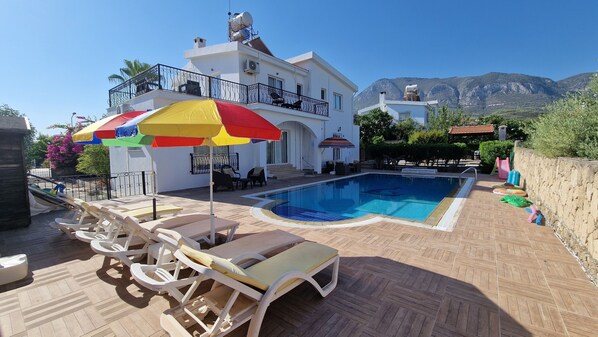 Villa and pool with stunning surrounding views of mountains 