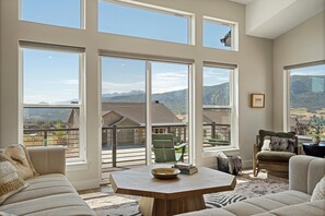 The living room has spectacular views of the mountains.