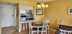 dining table can sit six with a bar that can seat 2