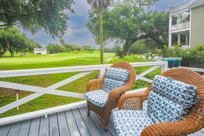 The back deck overlooks the fairway of the 4th hole of the Wild Dunes Resort Harbor Golf Course.
