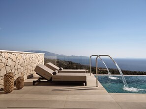 Waterfall featured in the iconic private infinity pool. 