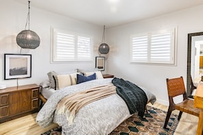 Modern meets cozy in this stylish bedroom.
