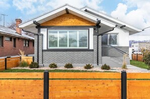  A classic exterior meets modern charm. This cozy home is ready to welcome you.