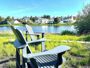 Adirondack chairs to lounge and watch the Grand Canal. Shared dock for fishing and relaxing.