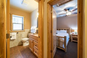 Entrance view of the bathroom and bedroom.