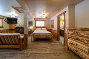 Northern Michigan themed furniture. Log queen sized bed. Full size futon and log dresser.
