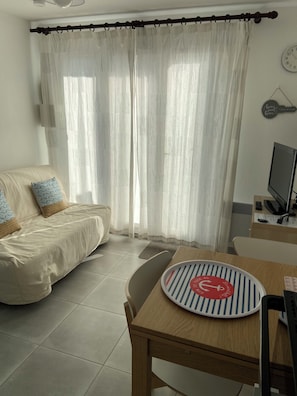 Coin canapé et TV