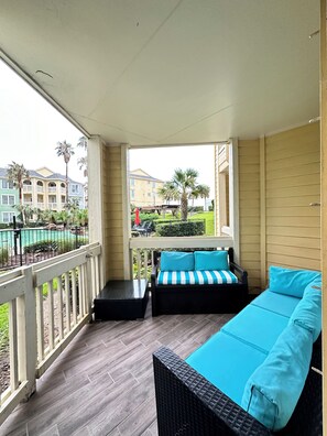 Outdoor patio with great pool views and direct access
.