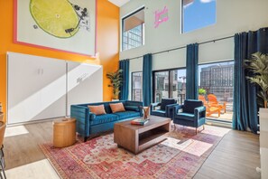 Open concept living room / kitchen / murphy beds