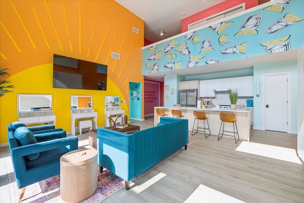 Open concept living room / kitchen / murphy beds