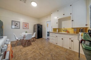 Updated, well-equipped kitchen and dining area (between living room and bedroom)