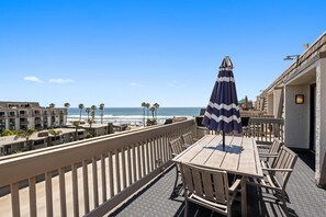 Enjoy a family dinner with ocean views from the upstairs balcony