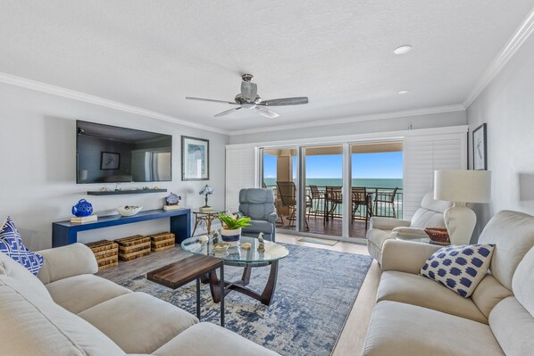 Beautifully furnished living room with smart TV and comfortable furnishings