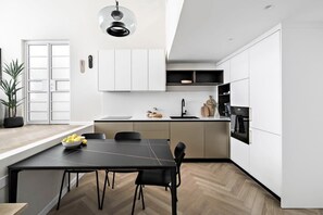 Fully equipped kitchen makes the apartment perfect for both long and short stays.