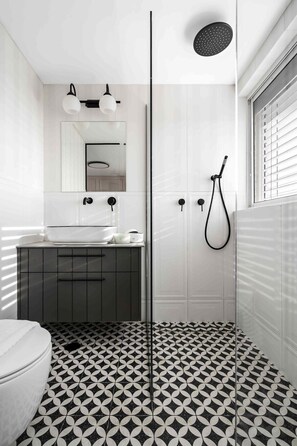 Elegant Black & White themed ensuite bathroom (frosted glass film was installed on this glass door for privacy)
