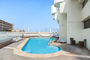 The swimming pool is perfect for sunny days! (The swimming pool is not private, it's shared by the building tenants)