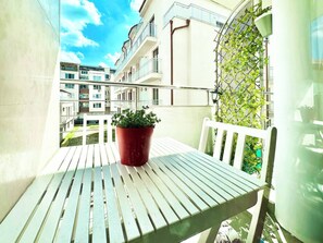 Step out onto our charming balcony and enjoy a breath of fresh air. Perfect for morning coffee or evening relaxation. Reserve today!