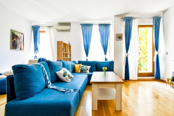 Relax in our serene master bedroom with a plush bed and cozy linens. Perfect for a restful night’s sleep. Book now!