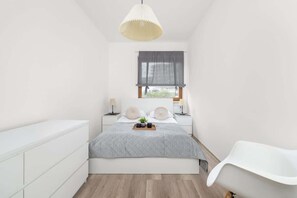 Bedroom with cabinet.