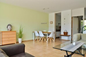 Cozy living room with sitting and dining area