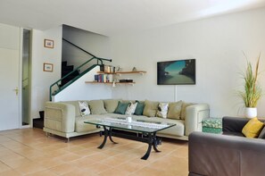 Cozy living room with sitting and dining area