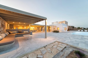 Covered poolside lounge area