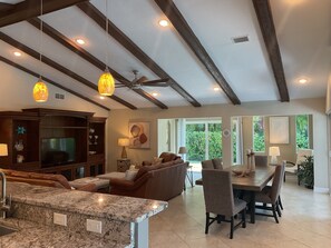 Large Open concept living and dining area, 20 ft vaulted ceiling.