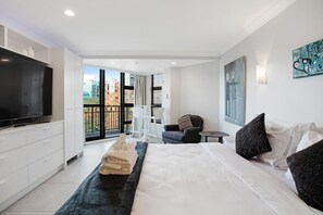 There is a balcony that you can open to enjoy the fresh air or view.