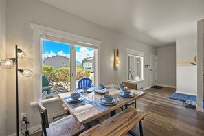 Dining Area for four flooding with natural light 