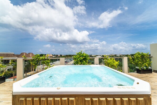 Soak under the stars: Indulge in relaxation in our poolside hot tub