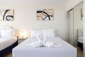 Indulge in comfort and tranquility in our spacious bedroom.