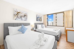 Drift into peaceful slumber in our serene and stylish bedroom.