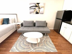 Gather, laugh, and create memories in our spacious living room.