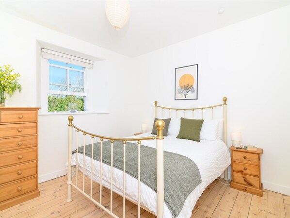 Dual aspect master bedroom with wardrobe and chest of drawers