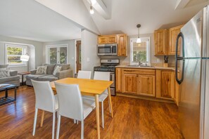Eat in kitchen offers a stove and refrigerator. No dishwasher on site.