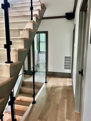 4 floors with custom glass rails