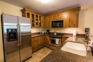 The kitchen comes fully-equipped for your convenience.