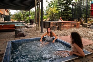 Take a dip in the shared outdoor hot tub!