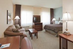 Sink into the cozy sofa after a day exploring the area.
