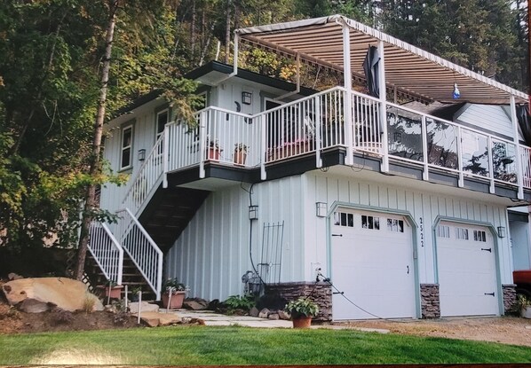 Private entrance on the side, along with private green and seating space to left