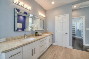Room1: master suite with private bath + walk-in closet + jacuzzi